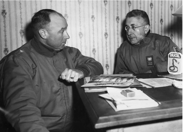 Brigadier General Robinson Duff, assistant commander of the 10th Mountain Division, confers with his Brazilian counterpart, General Mascarenhas de Moraes, in Italy. Photograph, Walter L. Galson Collection, TMD 60, Photo Box 6, 10th Mountain Division Resource Center, Denver Public Library (DPL). Image courtesy of the DPL.