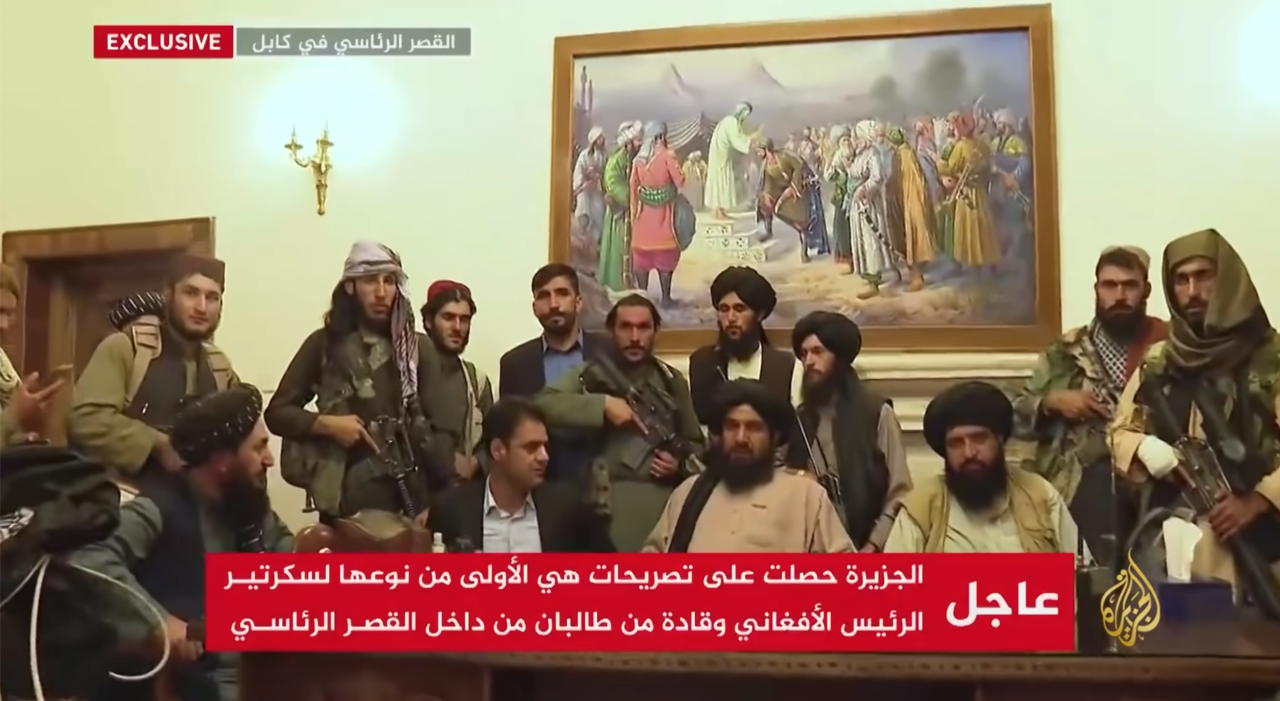 Senior Taliban members pose proudly at the presidential palace after their takeover in Kabul, Afghanistan on August 15, 2021.