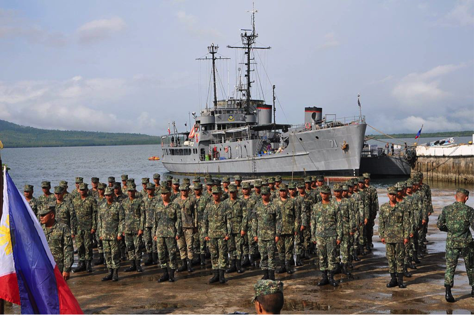 Philippine naval vessel, BRP Mangyan, and crew.