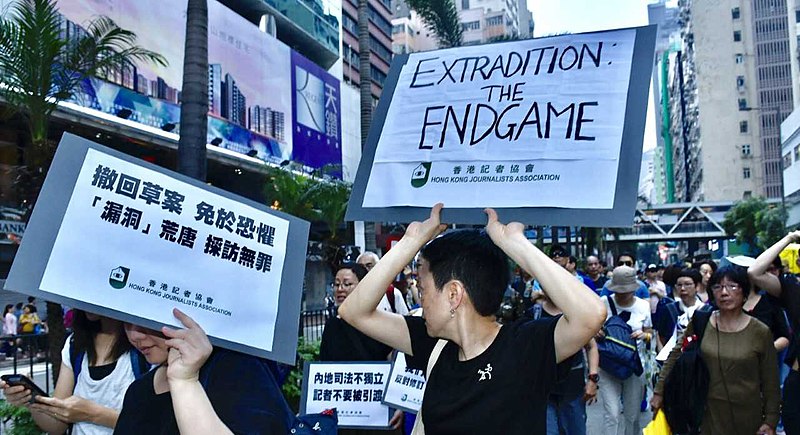 Members of the Hong Kong Journalists Association marched in solidarity with anti-extradition protesters.