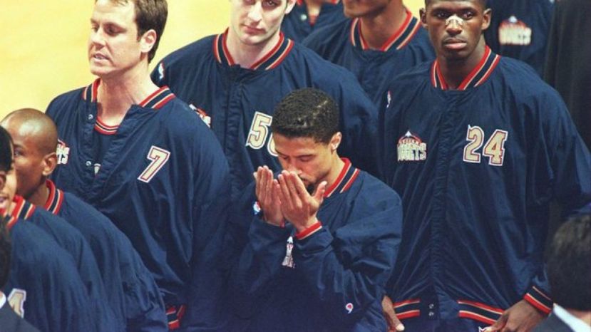 Mahmoud Abdul-Rauf in prayer during the National Anthem, 1996.