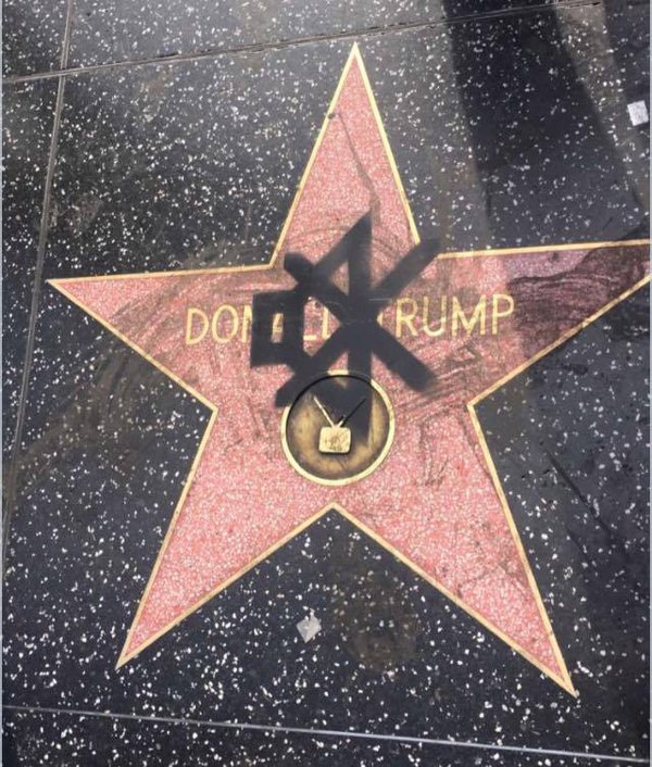 Graffiti on Trump’s Hollywood Walk of Fame star.