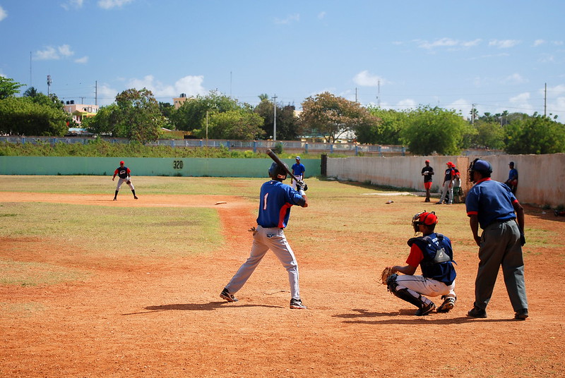 Dominican young men play for their local baseball schools, which are places for scouts to recruit. This field is next door to the Toros del Este's stadium