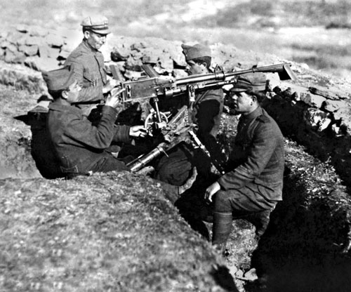 Greek troops with a machine gun during the war.