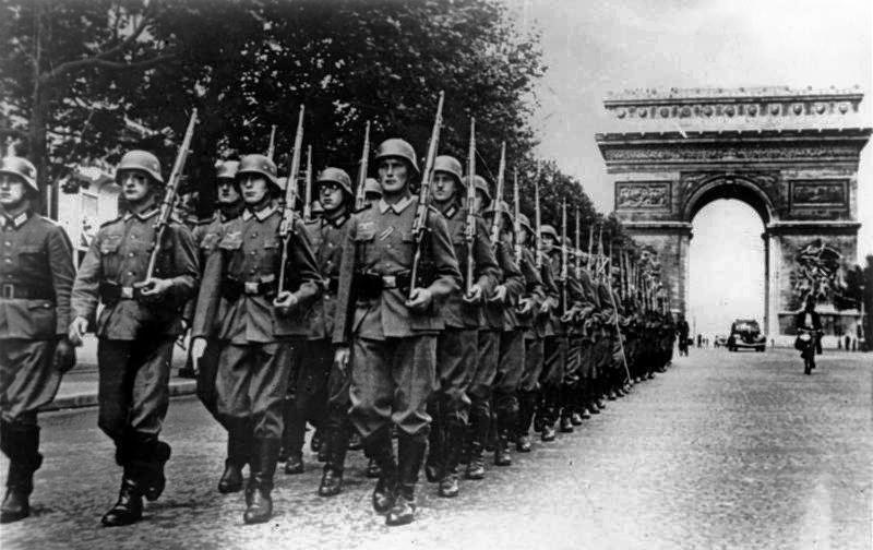 German soldiers parade on the Champs Élysées on June 14, 1940.