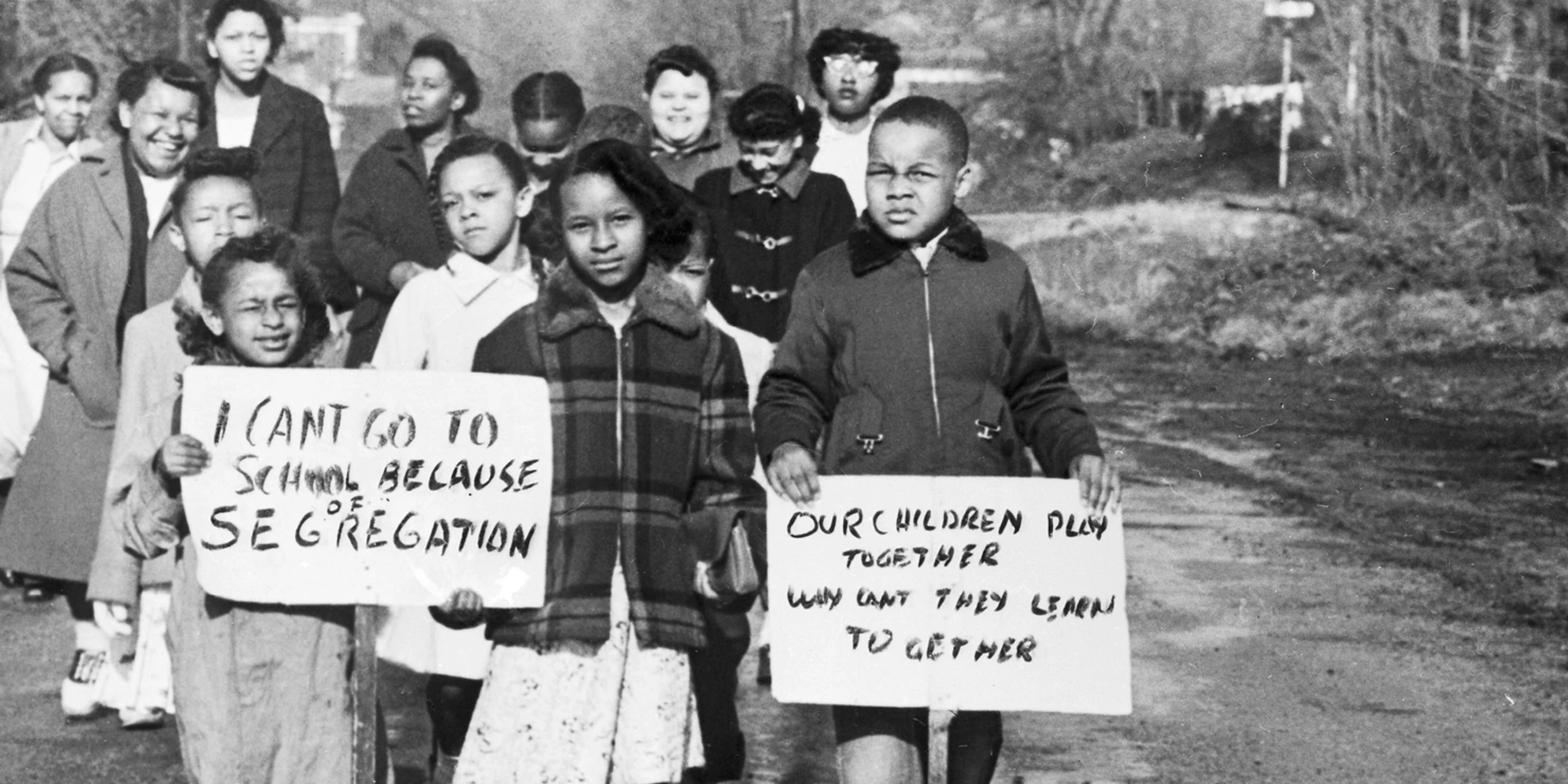 Mothers and children marching for school desegregation - Photo by Bettmann Collection/Getty Images