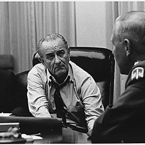 President Lyndon Johnson with Vice President Hubert Humphrey discussing strategy in Vietnam with General Creighton Abrams, 1968.