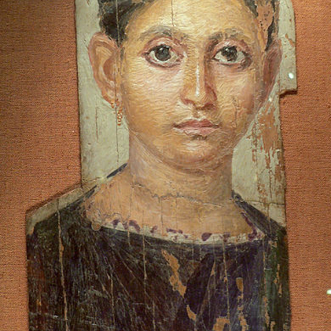 A mummy portrait of a young woman.