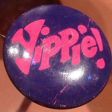 A button for the Youth International Party.