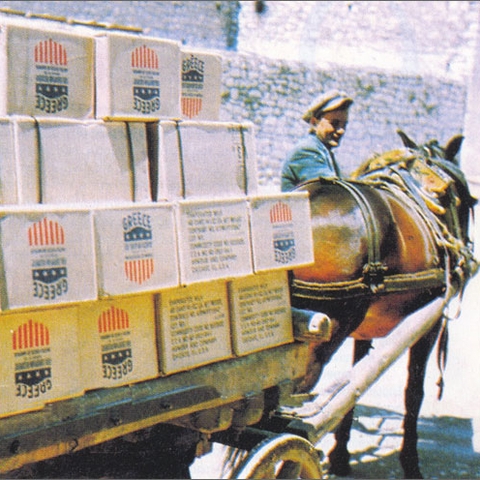 A donkey carrying Marshall Plan supplies in Greece.
