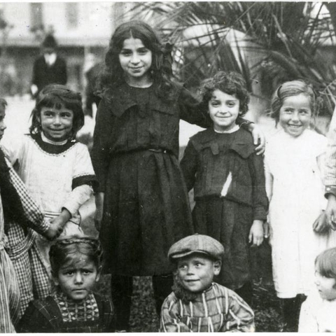 Immigrant children on the grounds of the Immigrants Hotel.