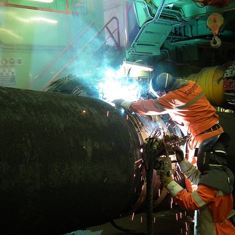 Two Nord Stream pipes are welded together on the Castoro Sei pipelaying vessel in preparation for laying them beneath the Baltic Sea, 2011.