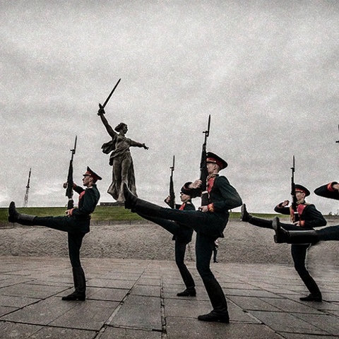 Soldiers marching in front of the memorial - The Motherland Calls in Volgograd. 