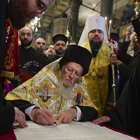 Bartholomew I, the Ecumenical Patriarch of Constantinople, signs the tomos (January 5, 2019) that officially established the Orthodox Church of Ukraine and granted it autocephaly.
