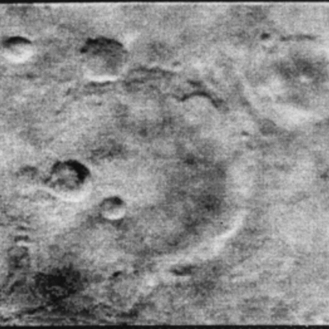 A photograph of craters on Mars.