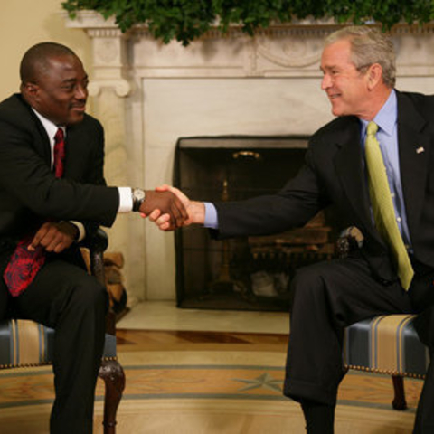 President George W. Bush meeting with President Joseph Kabila.