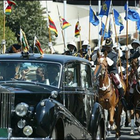 Procession of Robert Mugabe and his wife Grace Marufu