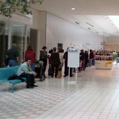 2,500 people line up in a mall in Texas City, Texas to receive a dose of the H1N1 vaccine from the Galveston County Health Department, October 30, 2009