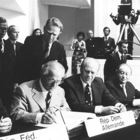 Leaders signing the Helsinki Accords in 1975.