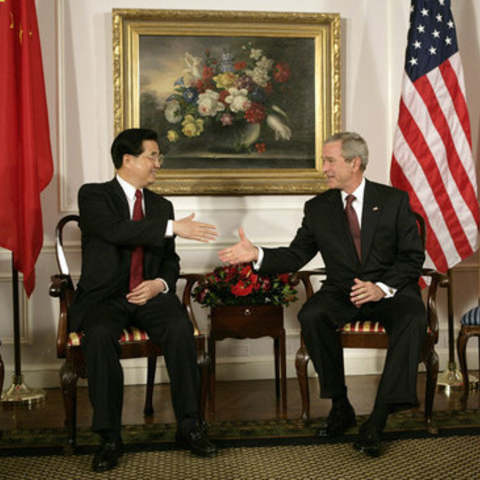 President George W. Bush and Chinese President Hu Jintao.