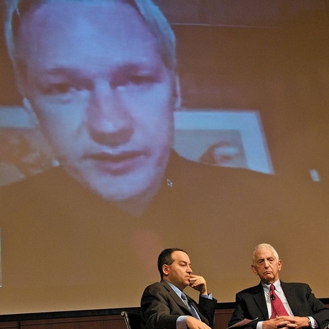 Micah Sifry (left) and Daniel Ellsberg talk as WikiLeaks founder Julian Assange looks on in a video chat in June 2010