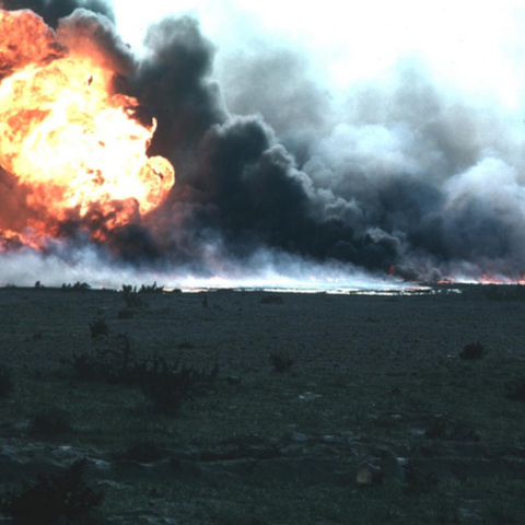 A burning oil field in Kuwait during Operation Desert Storm