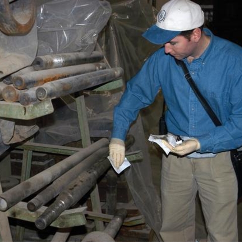 An International Atomic Energy Agency inspector at a factory in Iraq during weapons inspections in 2002.