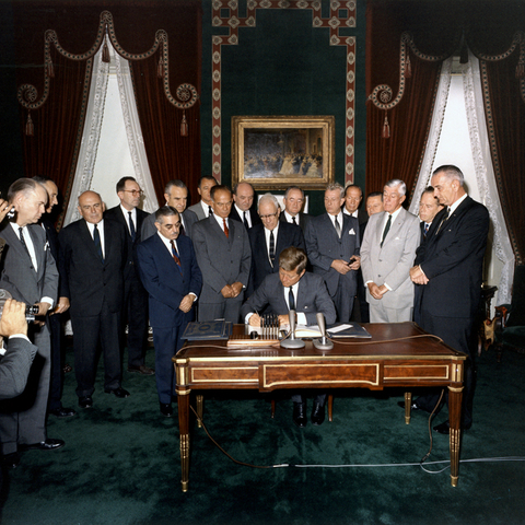 President Kennedy signing the Limited Nuclear Test Ban Treaty.
