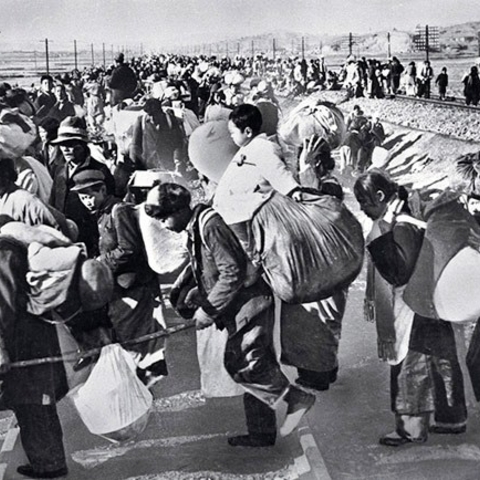 Koreans fleeing south in the mid-1950s after incursions by the North Korean army.