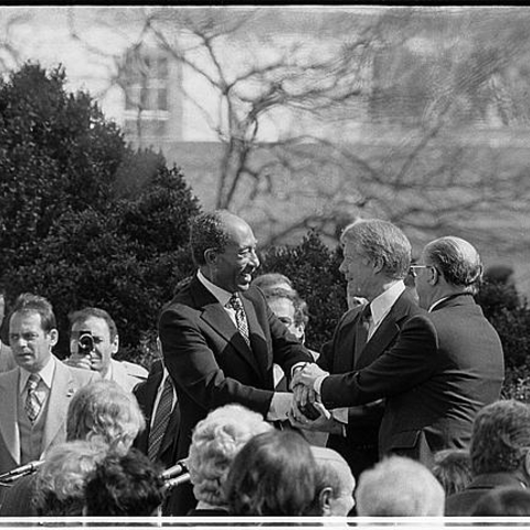 President Jimmy Carter, Egyptian President Anwar Sadat, and Israeli Prime Minister Menachem Begin.