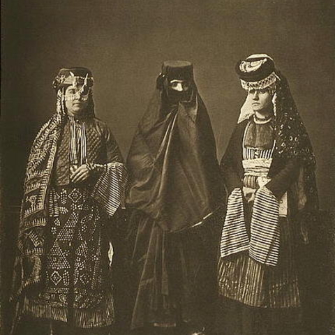 A 1873 studio portrait of three married women from Diyarbakir Province.