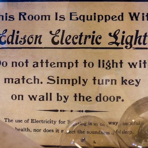 A sign with instructions on the use of Edison Electric Light.