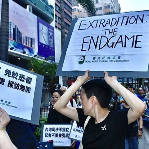 Members of the Hong Kong Journalists Association marched in solidarity with anti-extradition protesters.