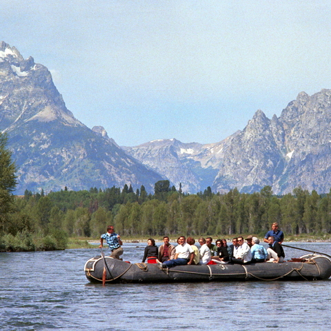 Lady Bird Johnson and others raft down the Snake River.