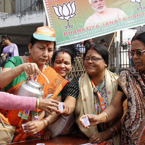 BJP worker distributing 'Modi Chai' to supporters.