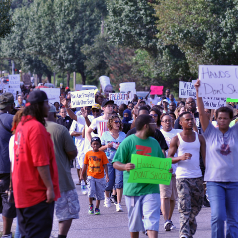 'Hands Up, Don’t Shoot,' protestors in Ferguson, Missouri.