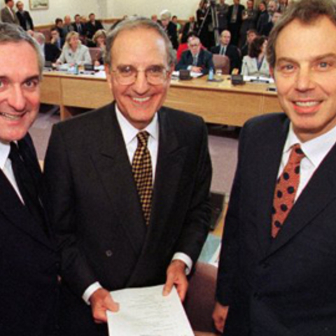 Irish Taoiseach Bertie Ahern, former U.S. senator George Mitchell, and British Prime Minister Tony Blair.