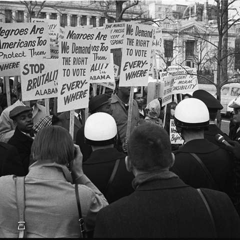 Demonstrators outside the White House protest police brutality in Selma, Alabama.