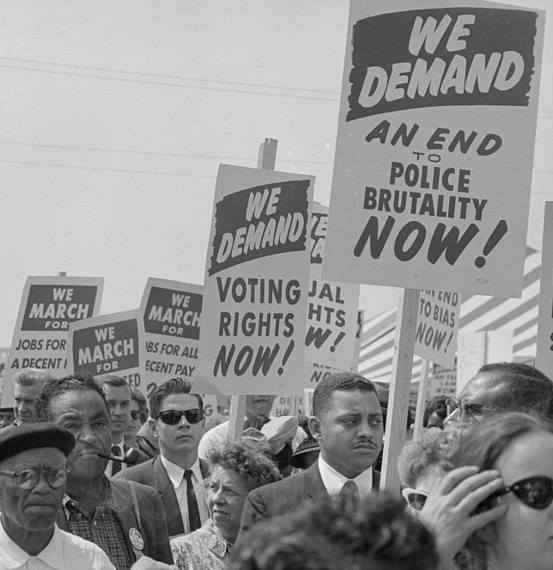 Demonstrators at the civil rights march on Washington, D.C. demand an end to police violence, August 28, 1963