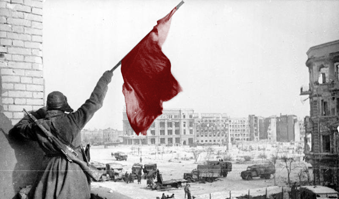A Soviet Soldier Waves the Red Banner
