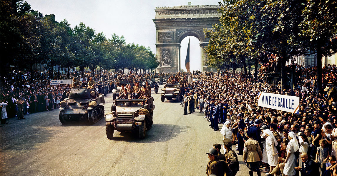 Troops of the French 2nd Armored Division parade down the Champs-Élysées on 26 August 1944