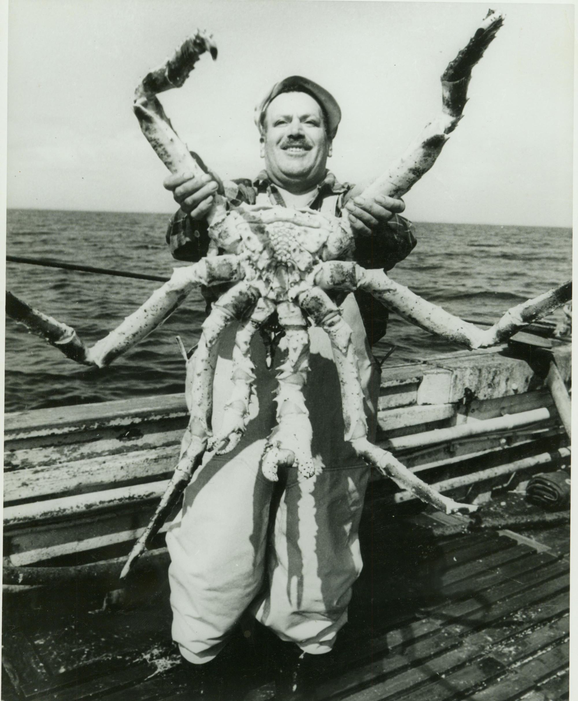 man with giant crab