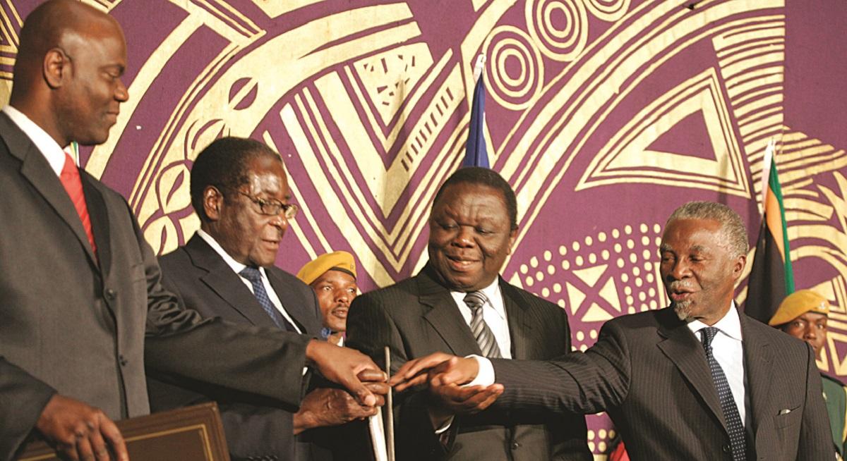 Government of National Unity in 2009. Left to right: Arthur Mutambara, Robert Mugabe, Morgan Tsvangirai, and Thabo Mbeki.