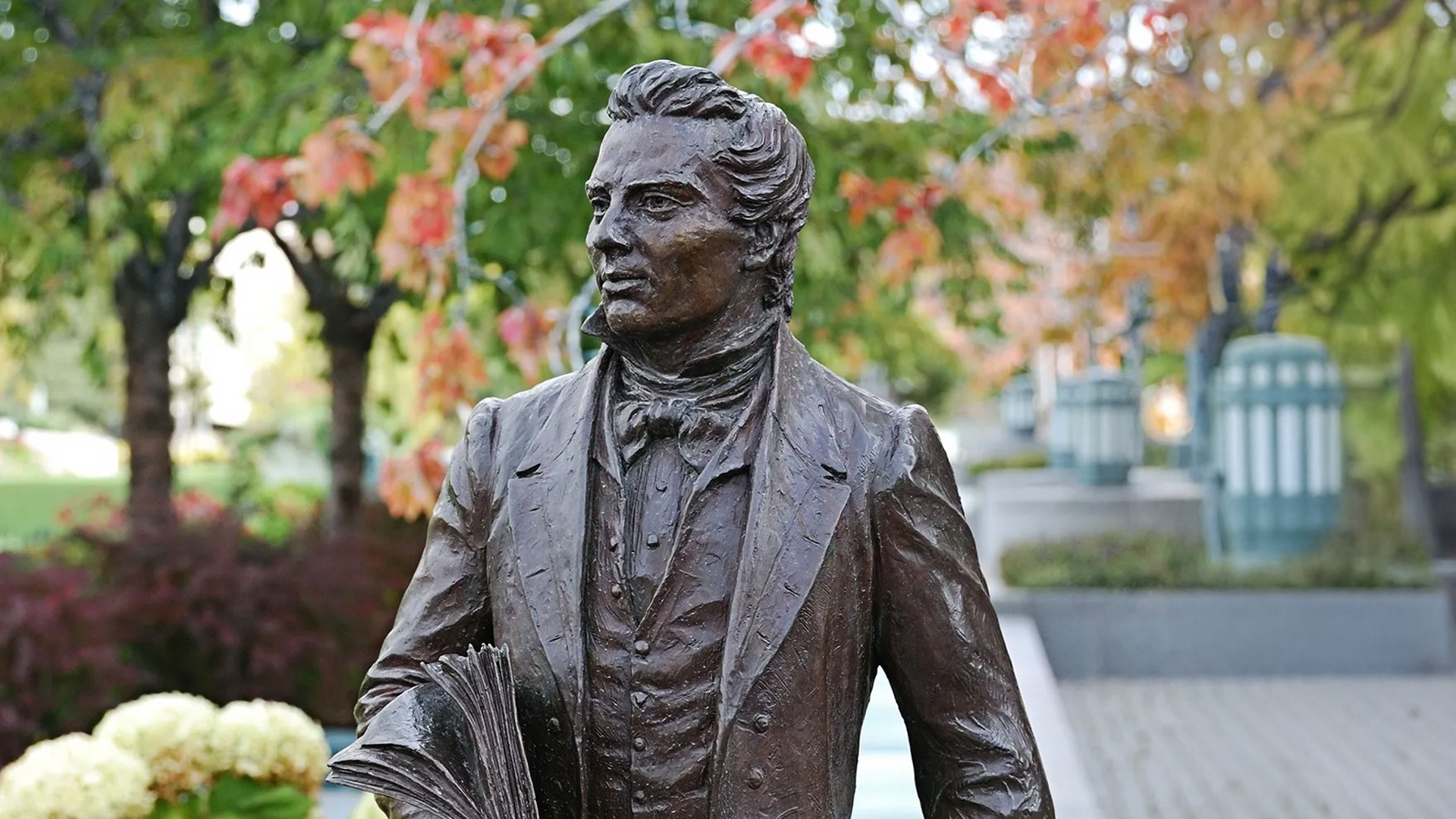 statue of Joseph Smith in a garden