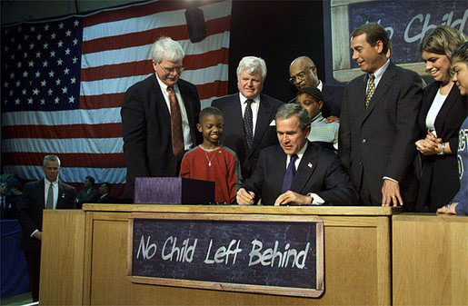 President George W. Bush signs "No Child Left Behind" into law in 2002.