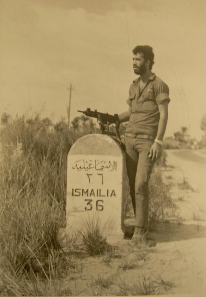 An Israeli solider stands guard on the road to Ismailia during the 1973 Arab-Israeli War.