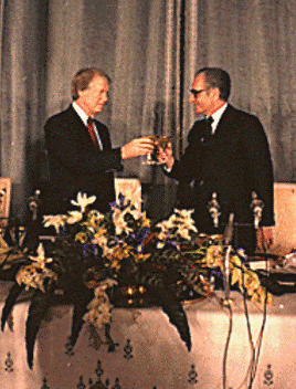 President Jimmy Carter offers a toast to Mohammed Reza Shah Pahlavi, calling Iran 'an island of stability in one of the more troubled areas of the world.'