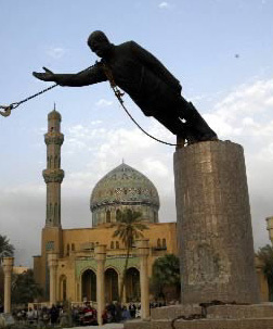 The statue of Saddam Hussein topples in Baghdad's Firdos Square on April 9, 2003.