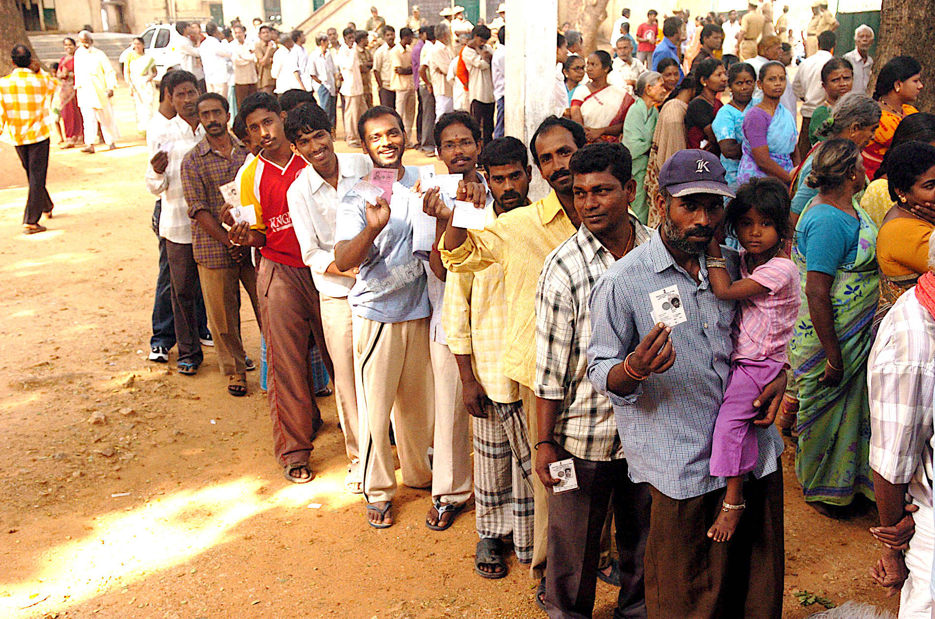 Men and women in Karnataka, India, voting in 2009 General Election.
