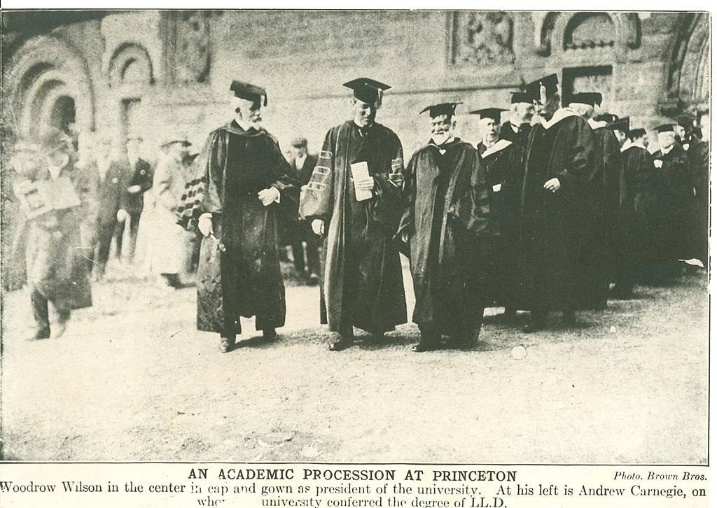 Academic procession at Princeton University. Woodrow Wilson (center) is speaking with Andrew Carnegie (right), 1905.